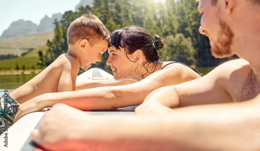 Nature, bonding and family swimming in a lake together while on vacation or adventure in the woods. Happy, love and mother embracing her boy child while having fun in pond on holiday or weekend trip. Nature, bonding and family swimming in a lake together while on vacation or adventure in the woods. Happy, love and mother embracing her boy child while having fun in pond on holiday or weekend trip.