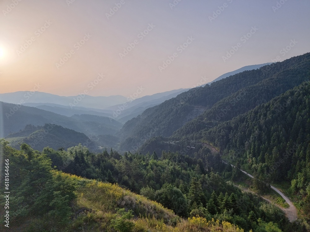 sunrise morning mountains back to back in spring morning in metsovo greece