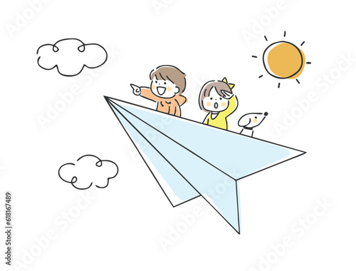 紙飛行機に乗っている子供