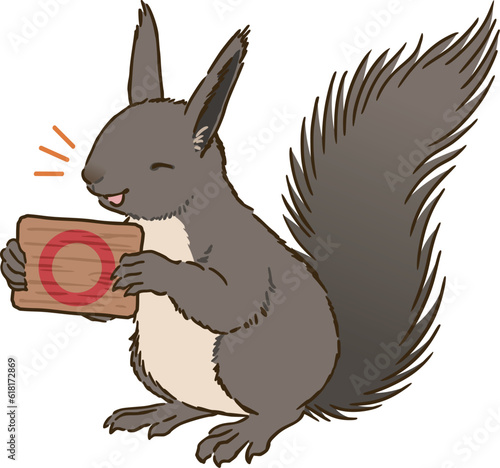 丸マークを描いた看板を持つエゾリス