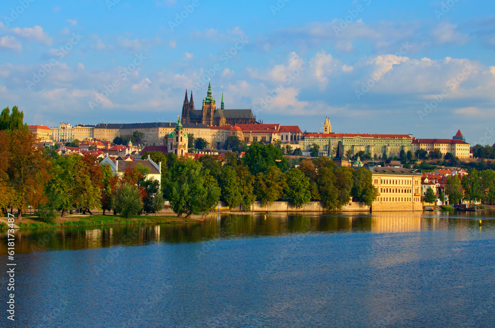 Classic panoramic view of medieval Prague. Scenic landscape of ancient Prague Castle and Saint Vitus Cathedral with Vltava River. UNESCO World Heritage Site. Travel and tourism concept