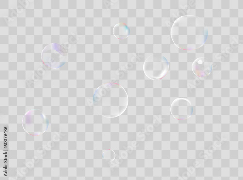 Set of realistic transparent colorful soap bubbles with rainbow reflection isolated on checkered background. Vector texture.