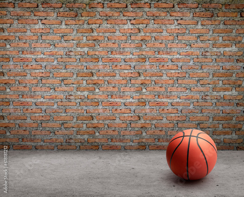 basketball ball in room with brick wall and cement floor © Retouch man