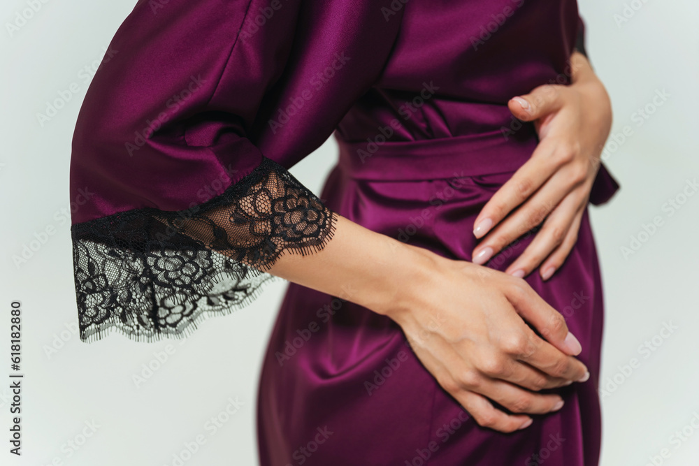 Φωτογραφία details of a purple and black nightgown on a girl