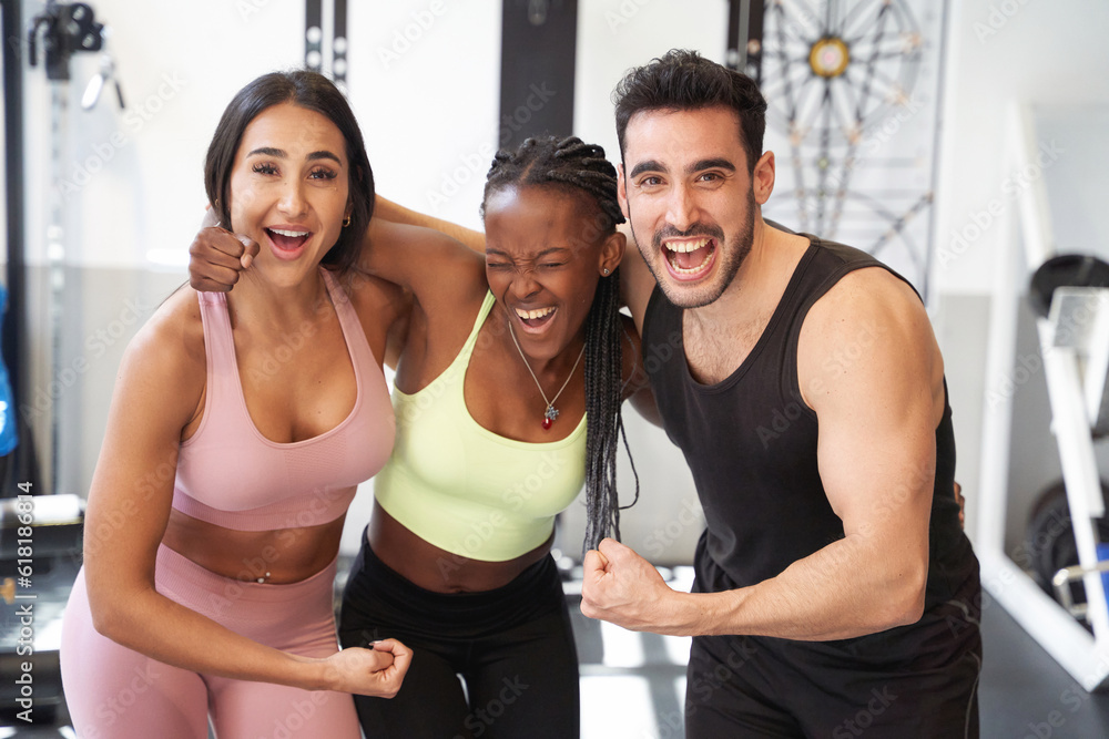 Φωτογραφία group of fitness friends flexing their arm very happy and smiling at the gym