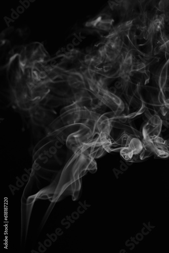 Fototapeta Naklejka Na Ścianę i Meble -  White smoke isolated on black background.