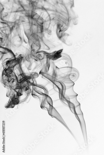 Black smoke isolated on white background.