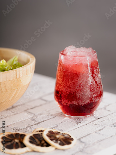 Fresh soda with salad and lemon slices