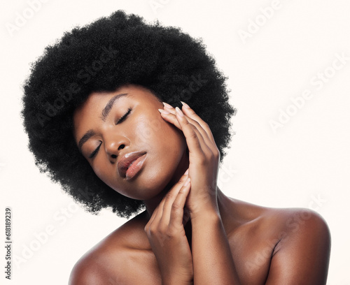 Black woman, touch face and skincare with eyes closed in studio isolated on a white background. Natural cosmetics, confidence and African model with spa treatment for aesthetic, wellness and beauty.