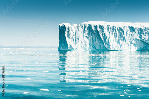 Big white icebergs in Atlantic ocean, Ilulissat icefjord, Greenland.