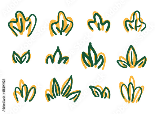 Set of green hand drawn leaves with pencil texture and yellow backing