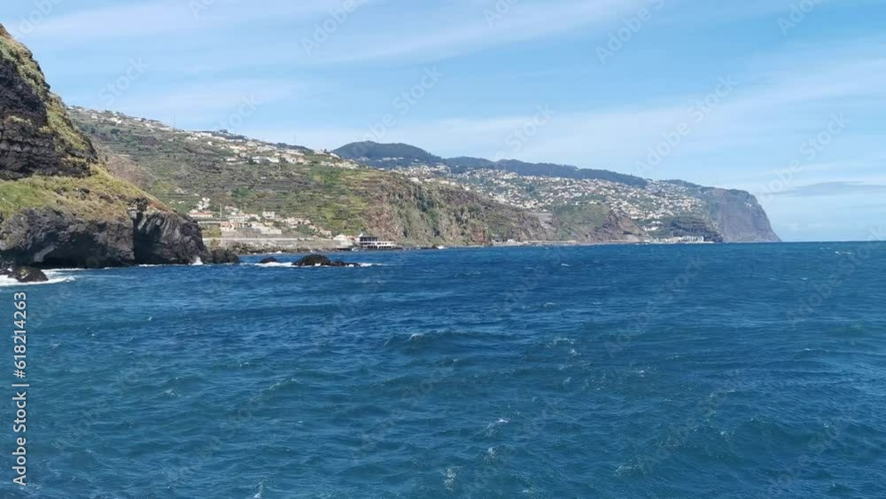 View at the Madeira Island south coast with Ribeira Brava village, from the Ponta do Sol Pier, atlantic ocean, on Madeira Island, Portugal View at the Madeira Island south coast with Ribeira Brava village, from the Ponta do Sol Pier, atlantic ocean, on Madeira Island, Portugal