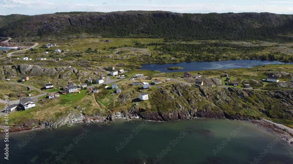 Aerial East coast landscape of high rocky cliffs and glacier tundra overlooking the village of Keels Newfoundland Canada.
Aerial East coast landscape of high rocky cliffs and glacier tundra overlooking the village of Keels Newfoundland Canada.