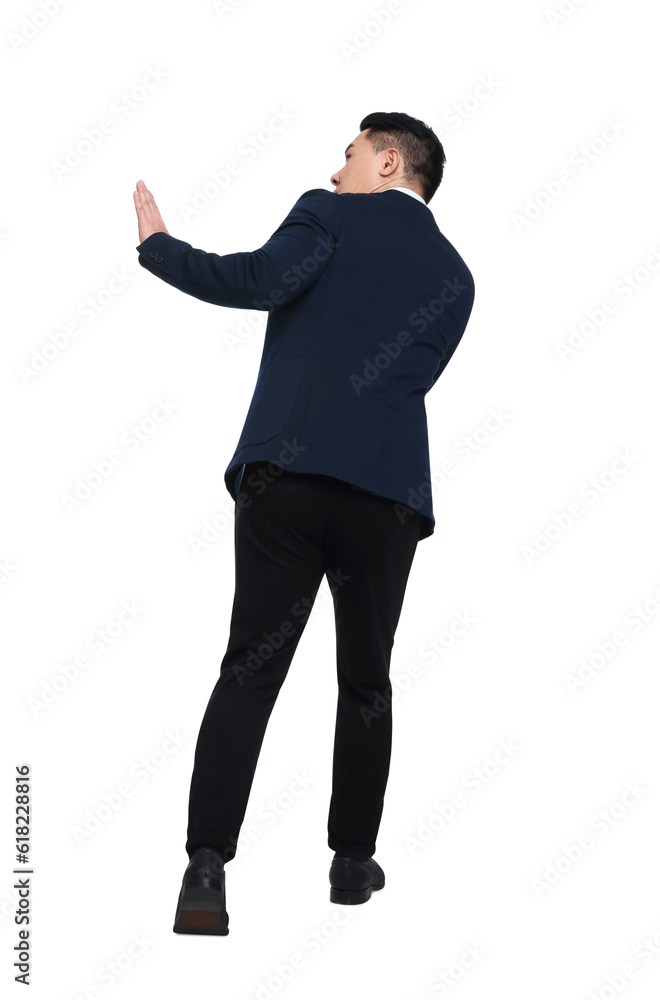 Scared businessman in suit posing on white background Scared businessman in suit posing on white background