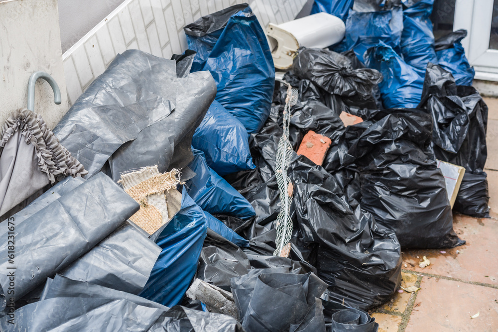 Various plastic carrier bags storing rubble and garbage, waste concept illustration. Various plastic carrier bags storing rubble and garbage, waste concept illustration.