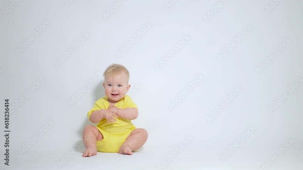 a child sitting on his ass expresses positive emotions a child sitting on his ass expresses positive emotions