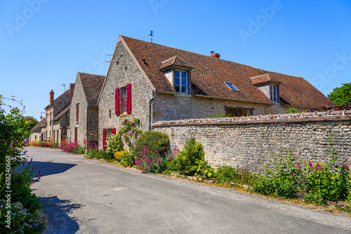 Fototapeta Naklejka Na Ścianę i Meble -  Traditional houses in Yèvre le Châtel, a medieval village located in the French department of Loiret, Centre Val de Loire, France