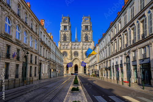 Symmetrical view on the Orléans Cathedral of Sainte Croix ("Holy Cross") from the Joan of Arc Street in the French department of Loiret in the Center of France
