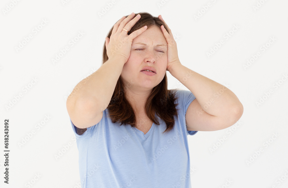 Exhausted pregnant woman touching her head with eyes closed. Female exchange worker suffering from unbearable headache. Health concept Exhausted pregnant woman touching her head with eyes closed. Female exchange worker suffering from unbearable headache. Health concept