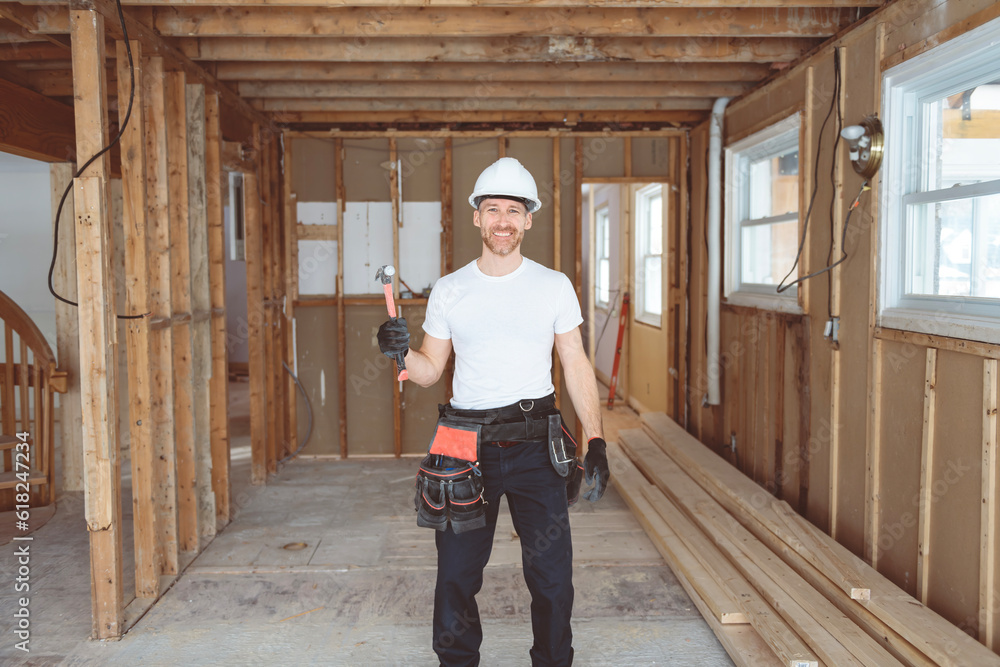 Construction Worker Building renovation an old house Construction Worker Building renovation an old house