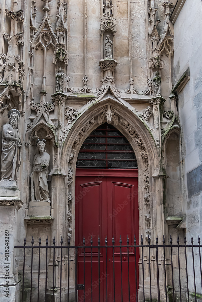 Fragment of Paris Gothic style Church of Saint-Merri (Eglise Saint-Merry, XVI) at street Rue Saint Martin. Paris, France.