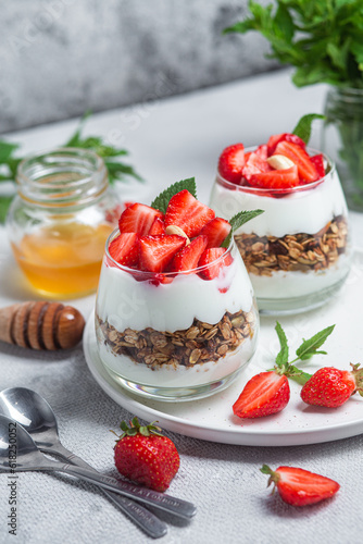 Granola with yogurt and strawberries in a glass
