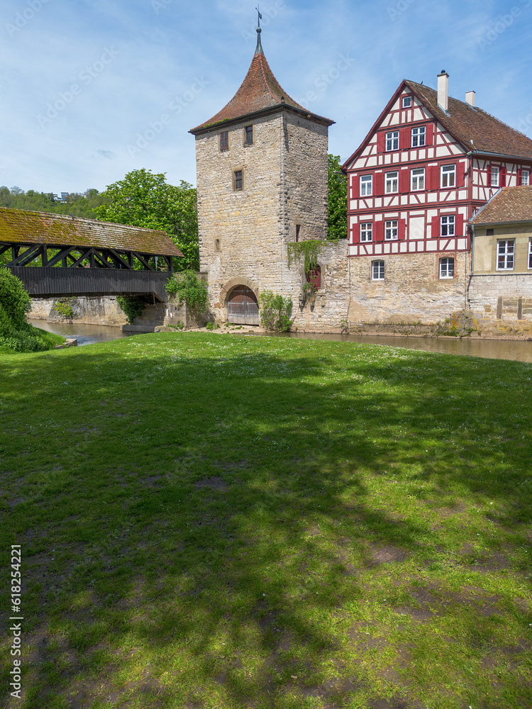 Schwaebisch Hall, half-timbered old town houses with a view of the church tower, drone shot