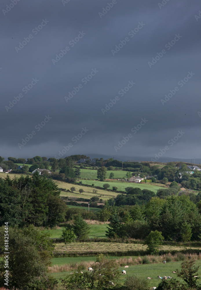 Hills and dark clouds. Westcoast Ireland. Country side.