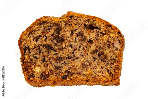 Slice of freshly baked homemade chocolate banana bread. Isolated on white background with copy space. Top view or flat lay.