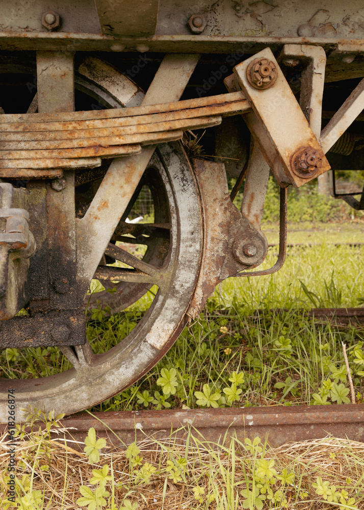 close up of an old trainwheel in brown rusty color