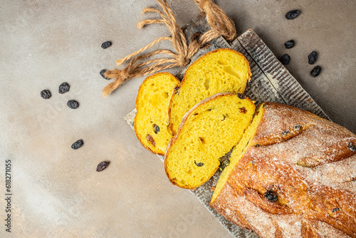 sliced turmeric bread with raisins. Healthy, clean eating. Healthy food concept. place for text, top view photo