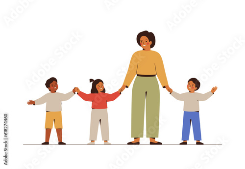Teacher with primary pupils stand together and hold hands. Preschool children with their caregiver. Multiracial Elementary students greeting their pedagog. Education concept. Vector illustration