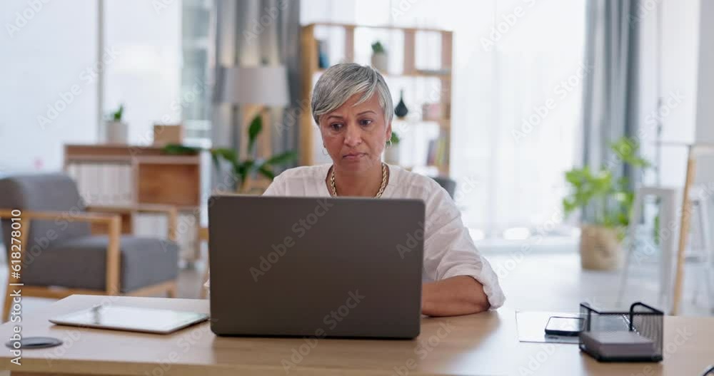 Laptop, typing and senior business woman, human resources or HR manager check employee files on company system. Research, office and elderly person working on KPI report, project or search online Laptop, typing and senior business woman, human resources or HR manager check employee files on company system. Research, office and elderly person working on KPI report, project or search online