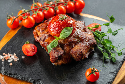 Juicy steak medium rare beef with tomatoes, Restaurant menu, dieting, cookbook recipe top view