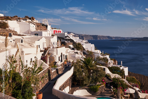 Panoramic Aerial View of Oia Village in Santorini Island, Greece - Traditional White Houses in the Caldera Cliffs