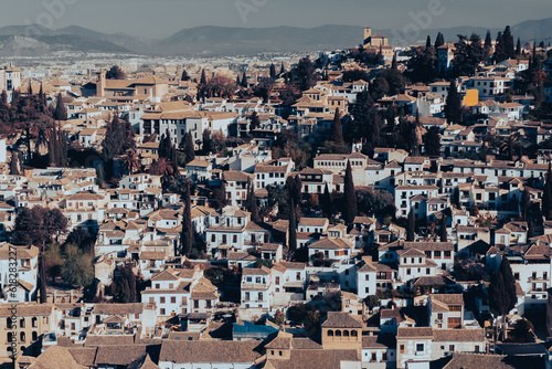 Granada,Spain. April 14, 2022:  Albaicin neighborhood architecture and blue sky. Panoramic landscape of the neighborhood. © camaralucida1