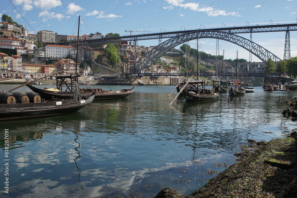 Barges used to carry port on the River Douro and the Terreiro da Sé in the city of Porto, Portugal 