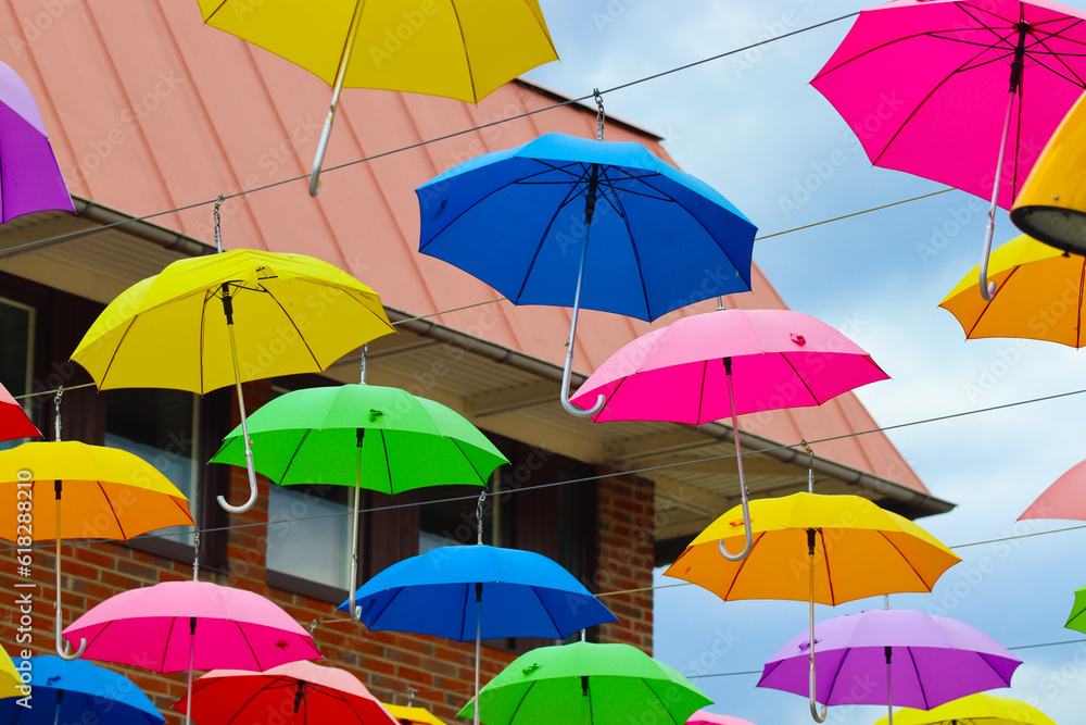 colorful umbrellas on white background