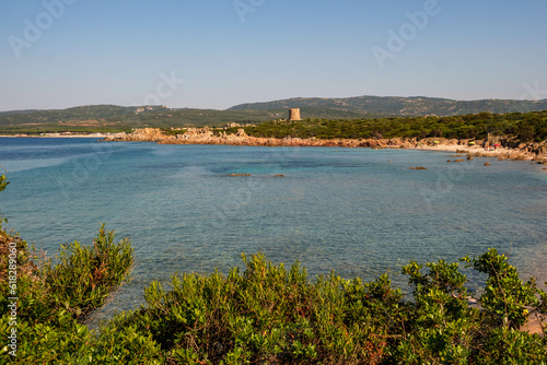 seascape of beach Aglientu Sardinia with tower
