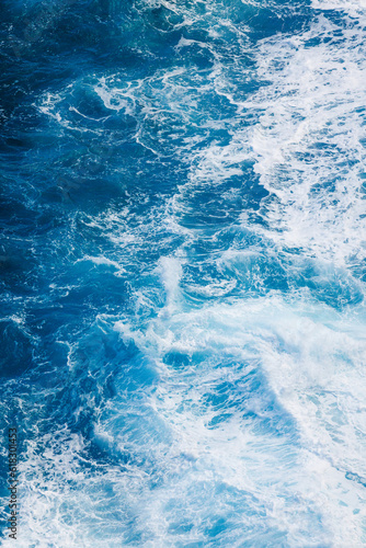 Blue Water Cresting in Chaotic Ocean Background