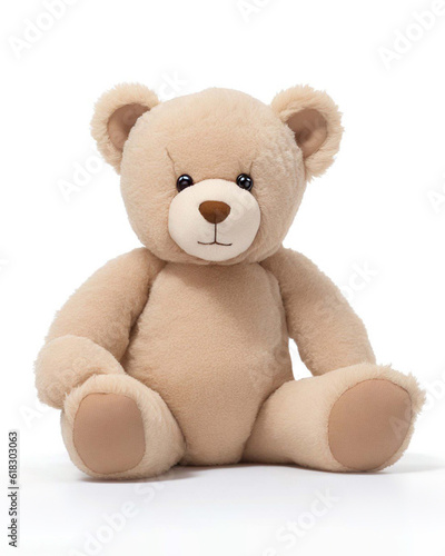 Teddy bear of beige color sits, isolated on a white background.