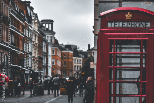 Red telephone booth in the city