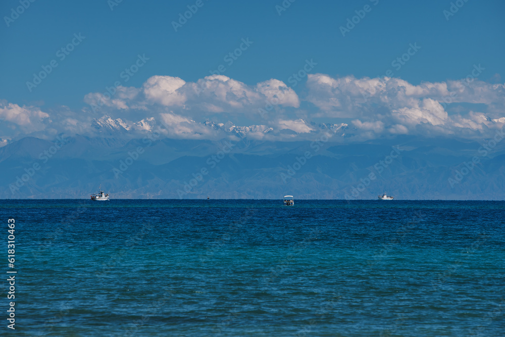 Yachts and ships on lake Issyk-Kul in summer, Kyrgyzstan