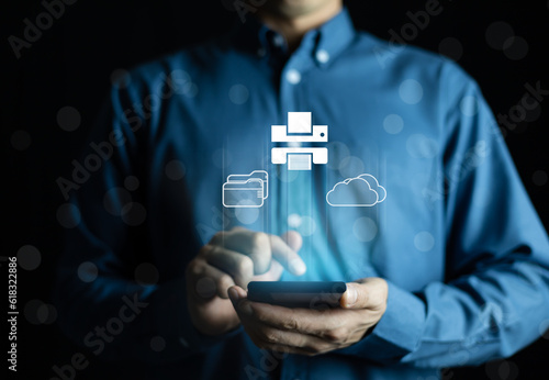 Cloud printing concept. Man use smartphone to wireless printer. Cloud print concept