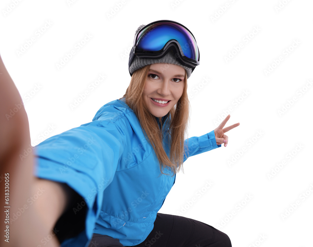 Beautiful woman in ski goggles taking selfie on white background Beautiful woman in ski goggles taking selfie on white background