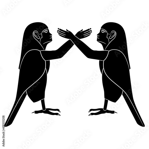 Symmetrical ethnic design with two Ba Birds. Ancient Egyptian sacred symbol of human soul. Black and white silhouette.