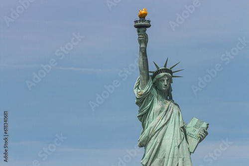 Statue of Liberty and New York City Skyline © ShutterFalcon