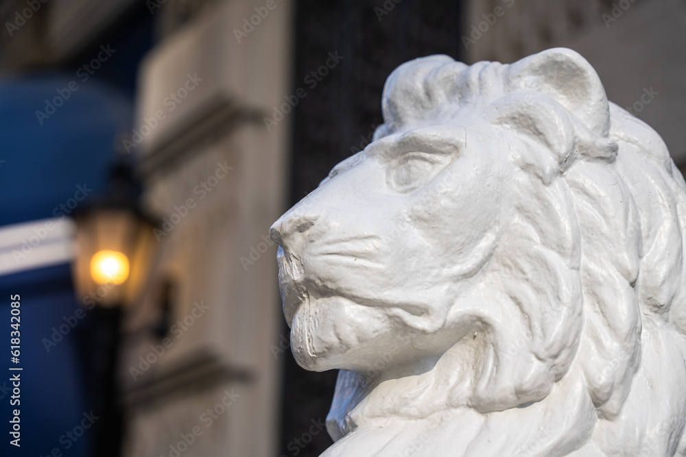 Lion statue outside an entryway