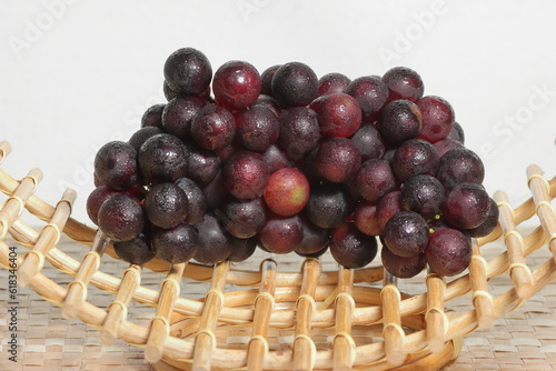 Wallpaper Mural Black grapes on texture background Torontodigital.ca