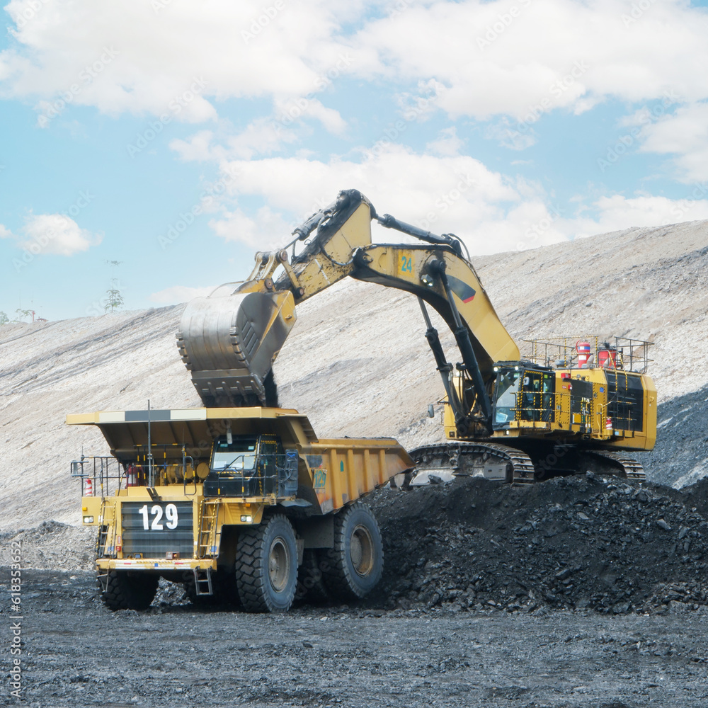 coal loading from excavator into truck, coal mine industry coal loading from excavator into truck, coal mine industry